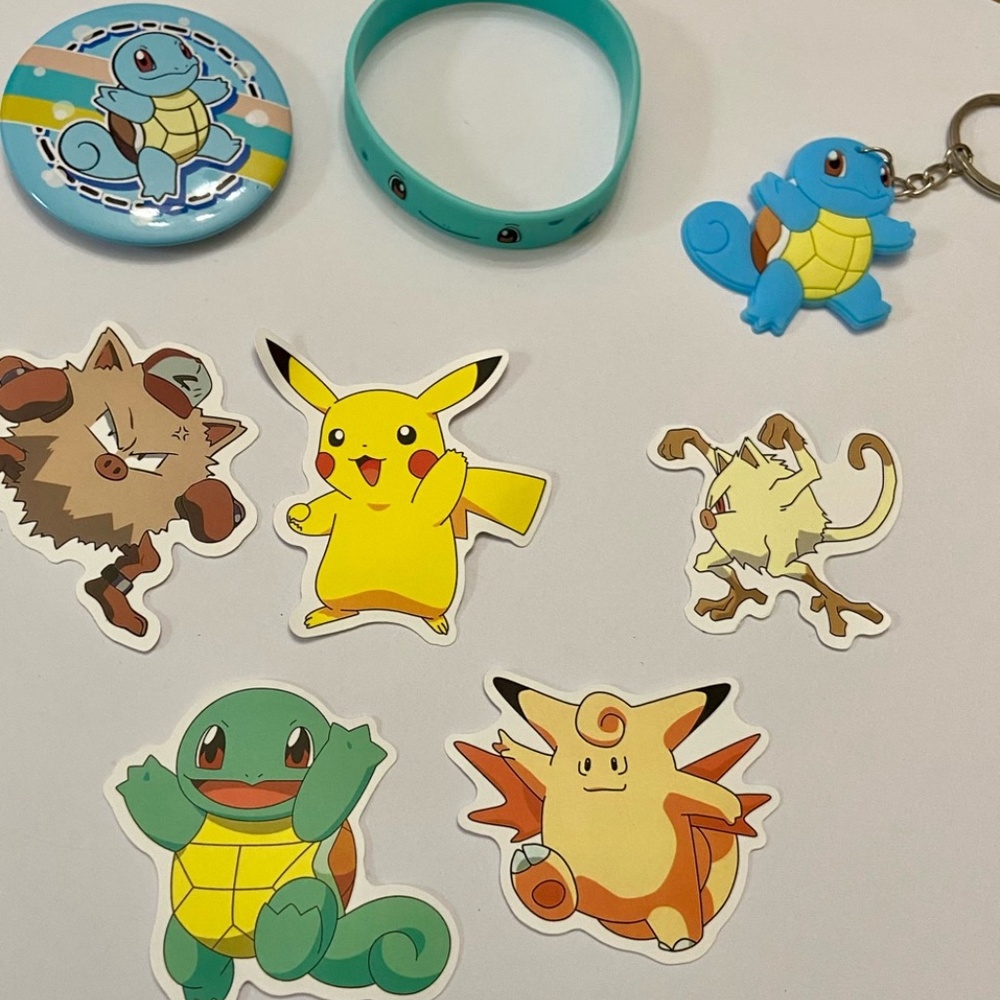 Lot of 8pc Pokemon Collectibles. (F)